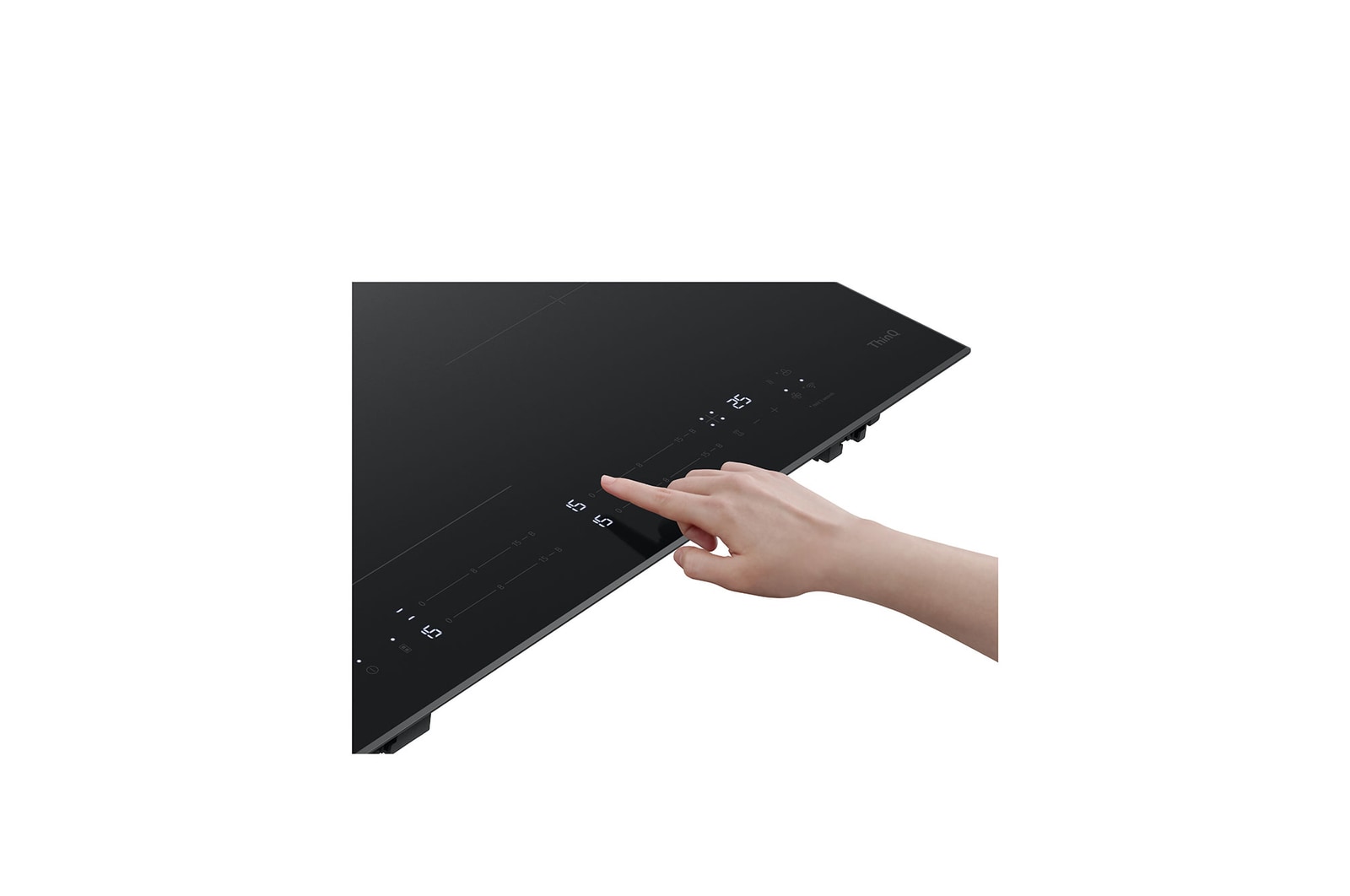 hand with switch oning Induction Cooktop 