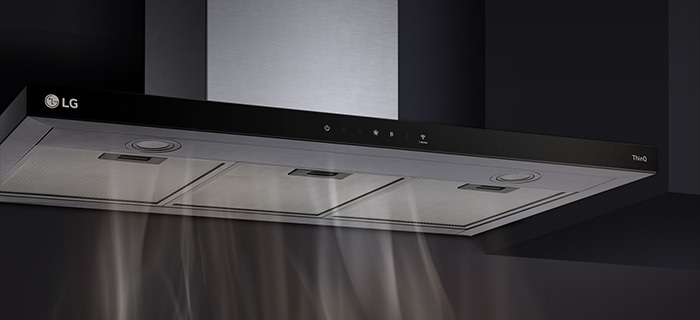  LG ThinQ kitchen exhaust hood in stainless steel, effectively removing smoke and steam above the stove area.