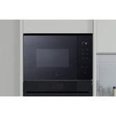 Built-in Microwave Oven with sleek touch control for convenient cooking.