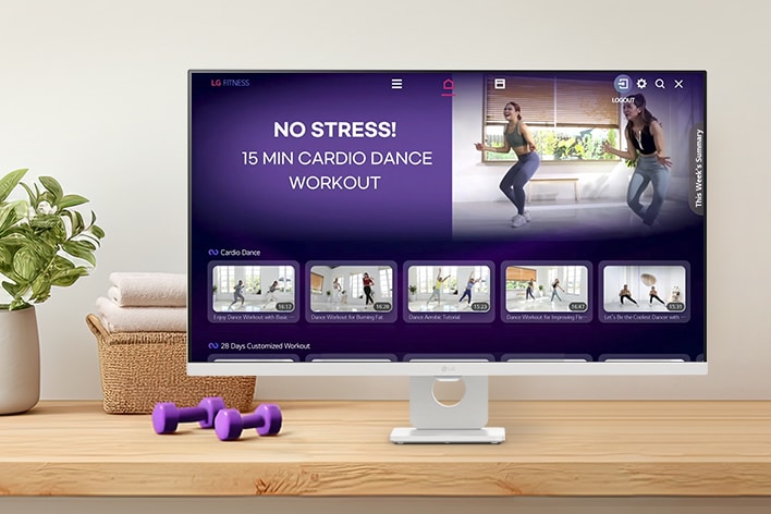 The LG Smart Monitor screen is showing various LG Fitness videos.	