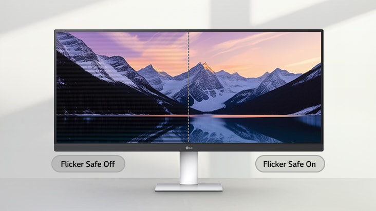 LG ultra-wide monitor displaying a split-screen comparison of a mountain landscape, with the left side showing screen flicker and the right side showing a clear, flicker-free image