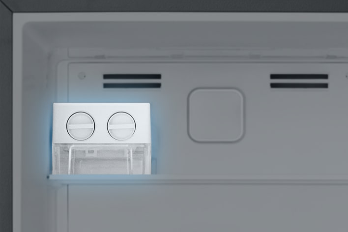 The detail view of twist ice maker in the freezer of lg top freezer refrigerator.