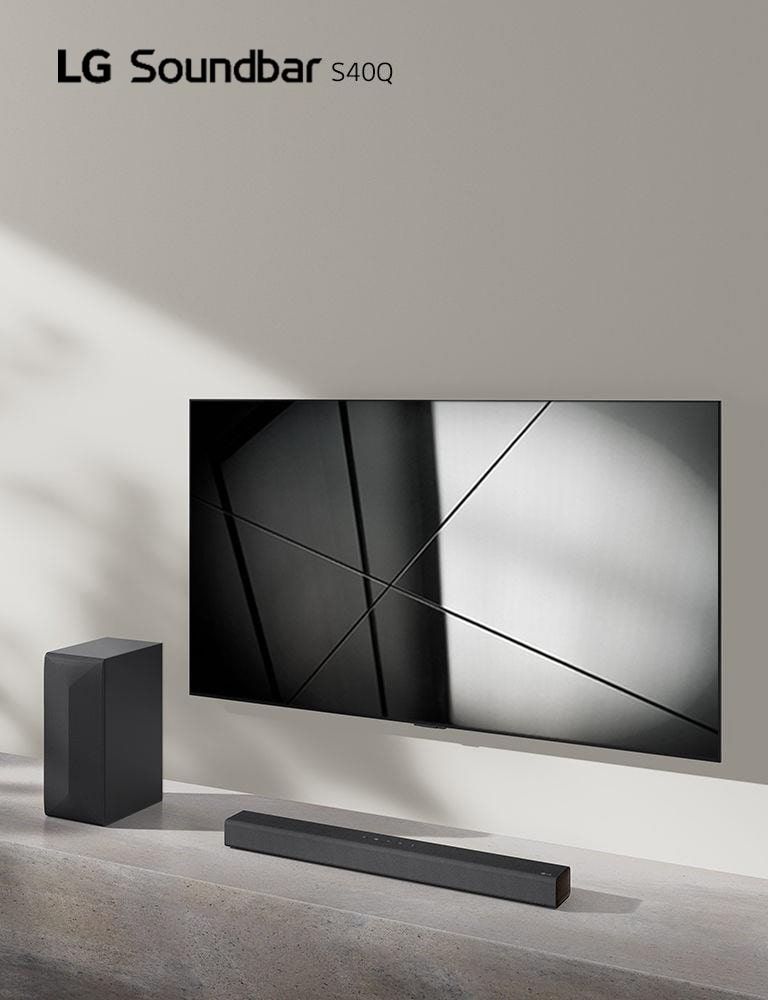 LG sound bar S40Q and LG TV are placed together in the living room. The TV is on, displaying a geometric image.