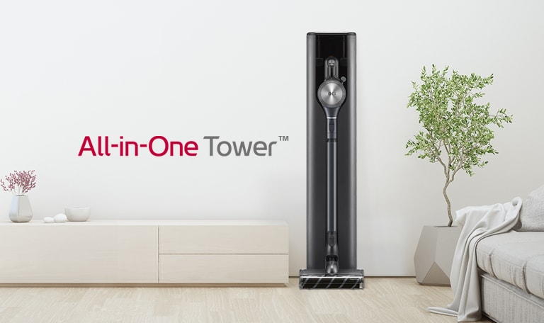 It shows a frontal shot of A9 All-in-One Tower in a white tone modern living room interior.