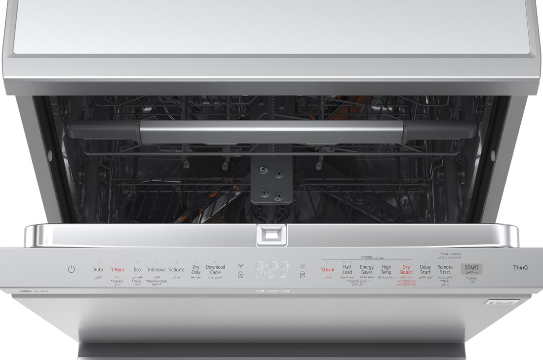 Top view of LG dishwasher with open door showing upper rack and control panel