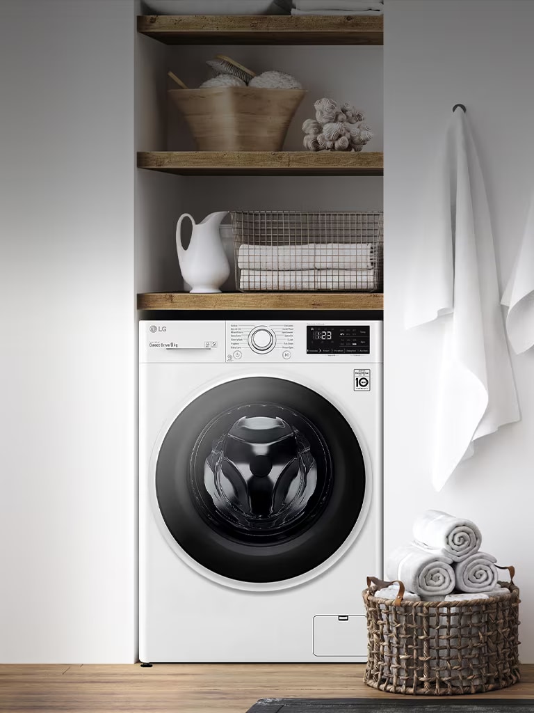 This is an image of a washing machine placed in a laundry room.