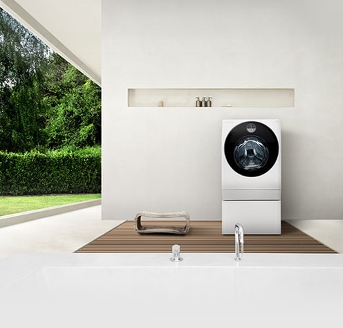 LG SIGNATURE Washing Machine is laid on the natural style laundry room.
