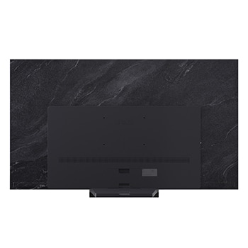 LG OLED evo AI C6 är väggmonterad i ett elegant vardagsrum, med en superslimmad design med smala ramar och visar ett stadslandskap vid en flod vid solnedgången på skärmen. 