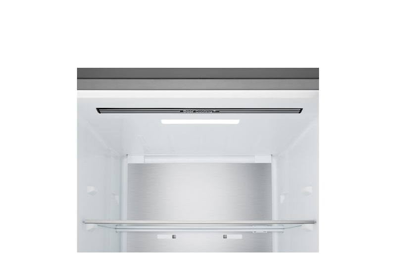 LG bottenfrys (GBBS726CPY) i infälld installation i hög varmt beige vägg med blåa pilar som pekar mot ovansidan och frontytorna