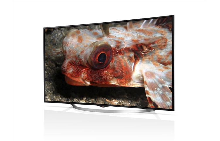 LG KURVAD PREMIUM ULTRA HD-SKÄRM MED INBYGGDA HÖGTALARE PÅ 35 WATT. DEN HAR ÄVEN WEBOS SMART TV MED PREMIUMINNEHÅLL, 3D, WI-FI, DLNA OCH MAGIC REMOTE., 65UC970V