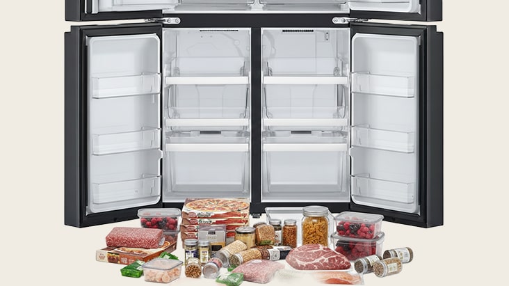 LG refrigerator with both doors open and various frozen food items such as meat, vegetables, and jars placed in front of it.