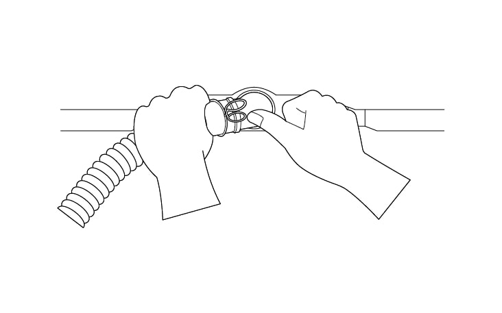 Push the elbow hose toward the body of the washing machine