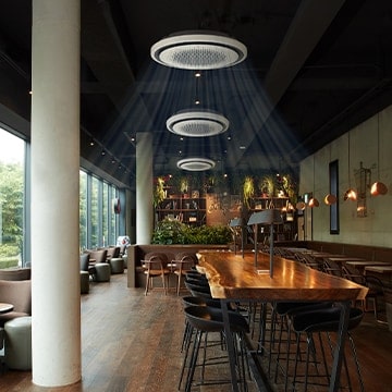 An image of a coffee shop at shopping mall with air conditioning on.