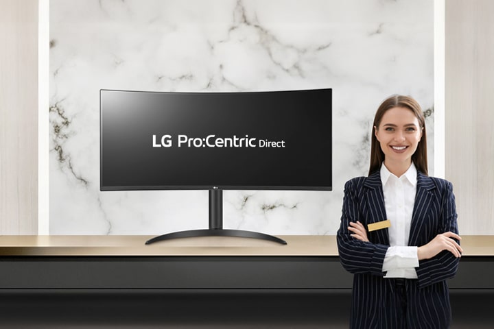 The LG Pro:Centric Direct solution text is visible on the monitor, accompanied by a smiling hotelier.	