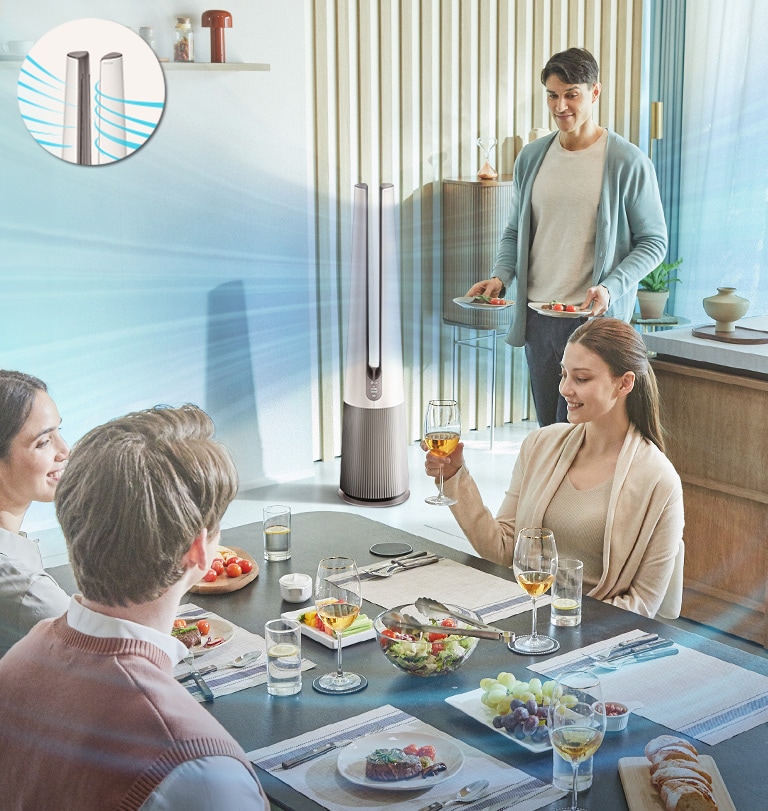 2 women and 2 man are in the dining room with the food. The product is operating as wide mode.