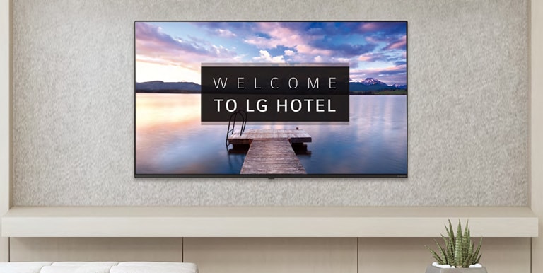 A TV is screening greeting messages with images.