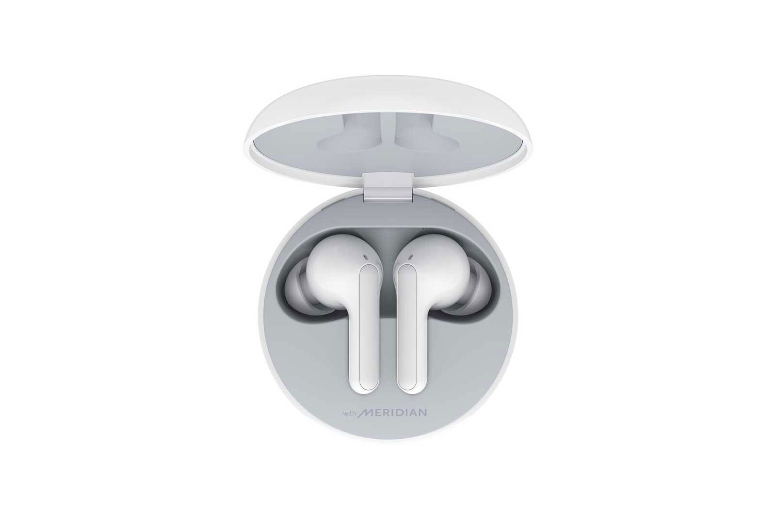 A top view of a cradle opened up and two earbuds inside it
