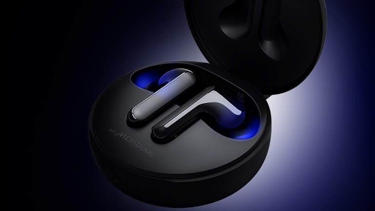 An image of two earbuds in a cradle with blue lighting on