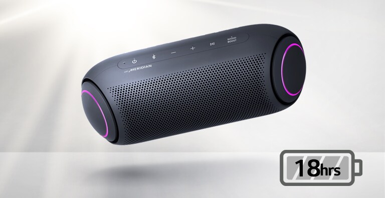 LG XBOOM Go tilts to the left and floats in the air. The woofer lighting is magenta.
