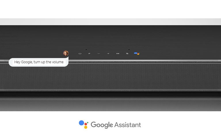 Close-up LG Soundbar mid-section with audio controls and Google Assistant logo. With Google voice command to turn up volume.