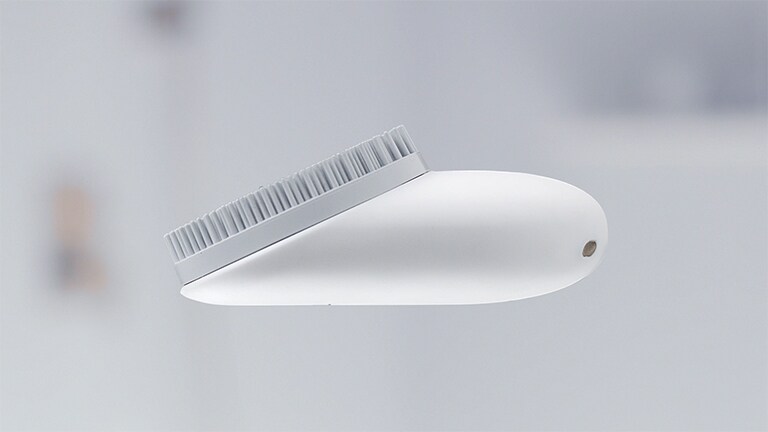 The person is touching silicon brush.