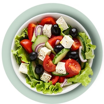 Fresh and green vegetables and ingredients are placed on the plate.