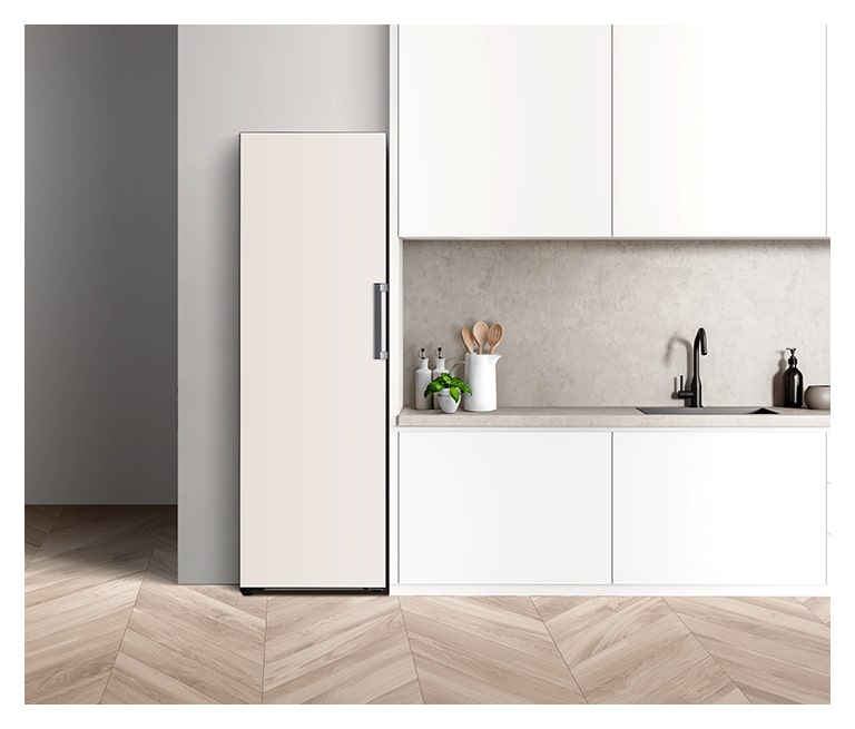 It shows mist beige color LG Freezer Objet Collection is placed in a bright-tone modern kitchen.