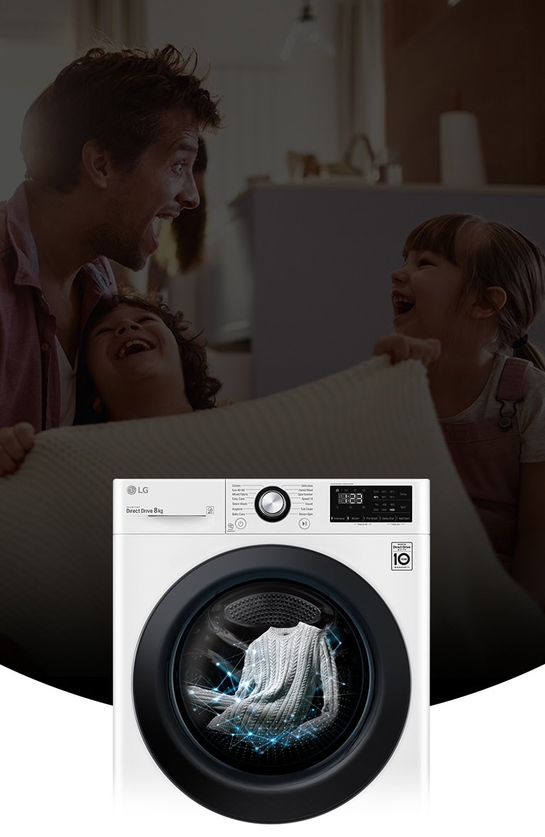 A family sits in a cozy living room with an LG washing machine in the foreground, showcasing its advanced technology.