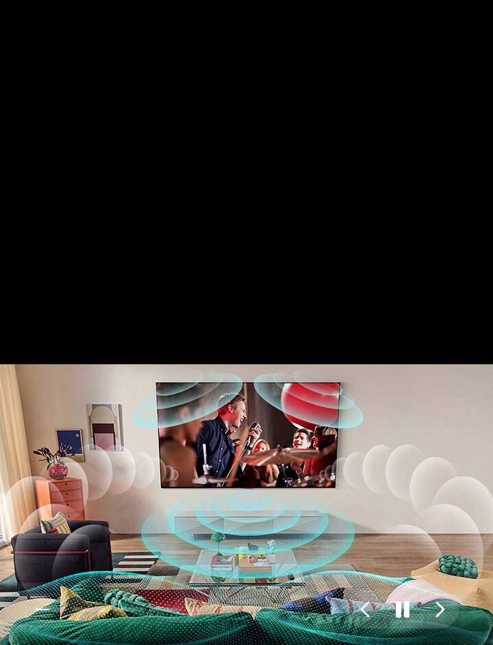 An image of an LG OLED TV in a room showing a music concert. Bubbles depicting virtual surround sound fill the space.