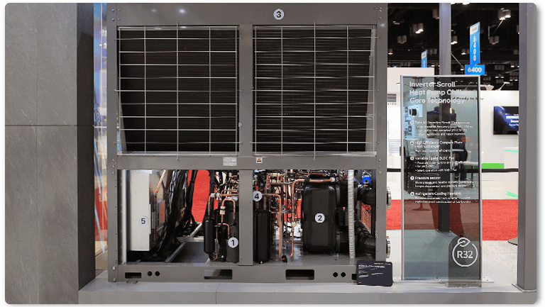 Inverter scroll heat pump chiller with R32 refrigerant, smart control, and modular design at AHR 2025.