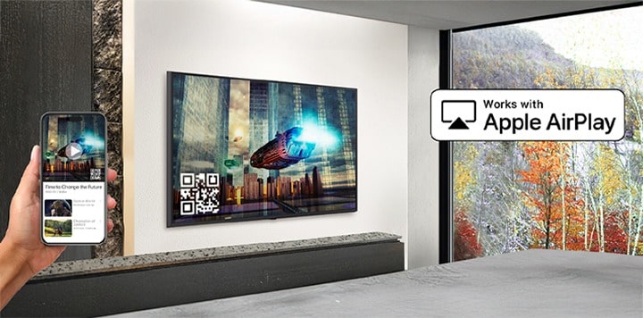 A hotel guest is pairing their iPhone with the in-room TV through AirPlay.