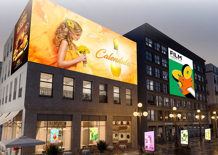 It displays a virtual space where various types of signage, such as large LED displays, window-facing displays, and open-frame displays, are being used.	