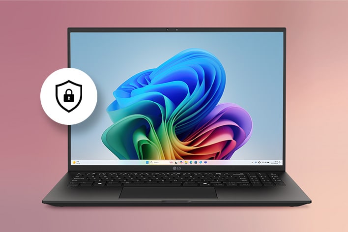 This image shows a laptop with the Windows 11 default wallpaper on its screen. A security shield icon with a lock is displayed on the left, symbolizing enhanced security and privacy features.