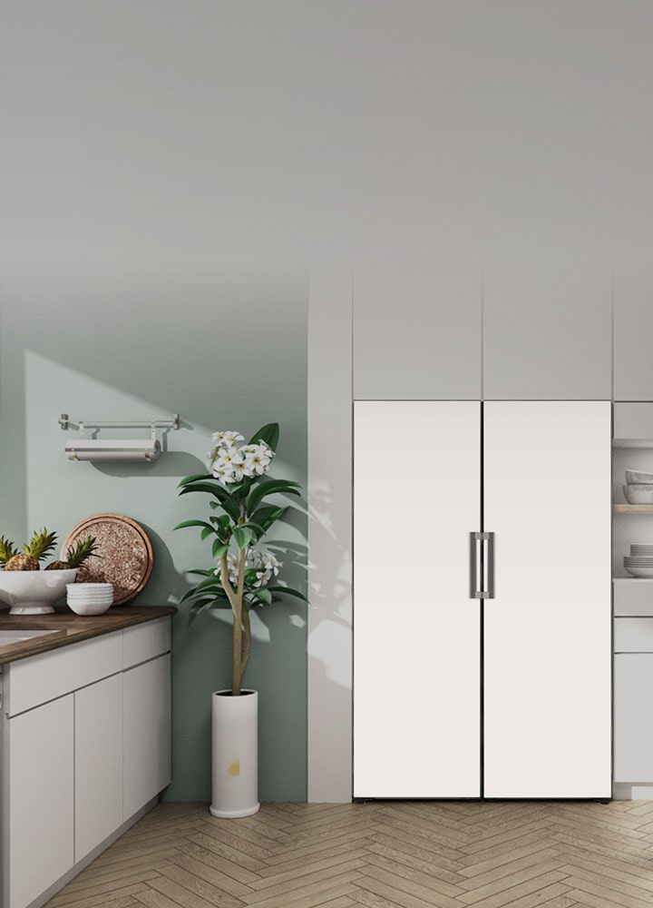 The front view of the refrigerator and freezer or shown fitting in seamlessly in a modern kitchen.