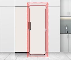 Front view of refrigerator fitted seamlessly into a kitchen space, next to a kitchen sink.