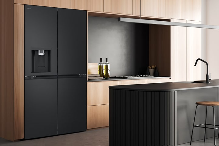 Modern kitchen interior with InstaView fridge.