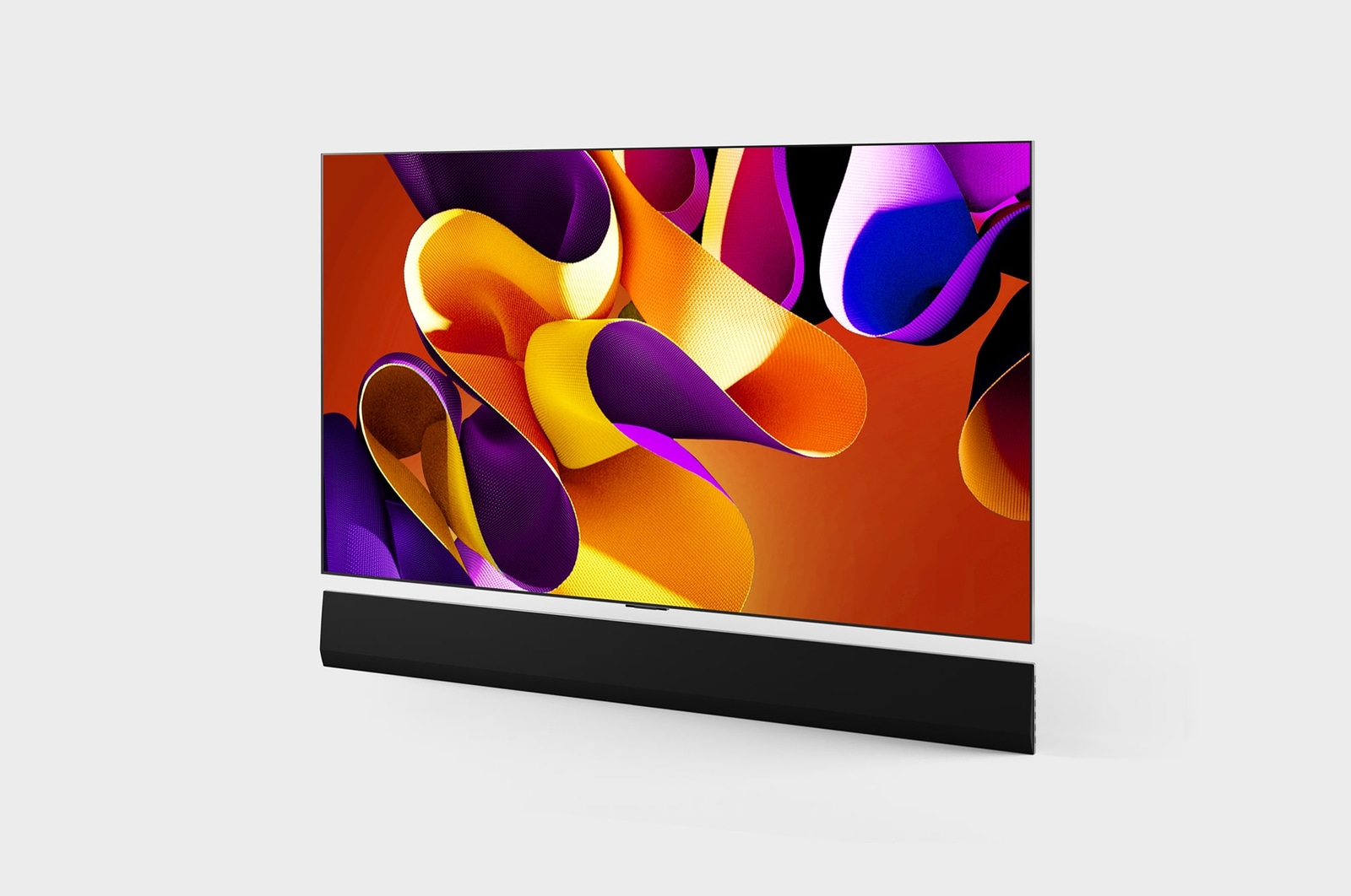 Slightly-angled left-facing side view of LG OLED G4 on the wall with the Soundbar below