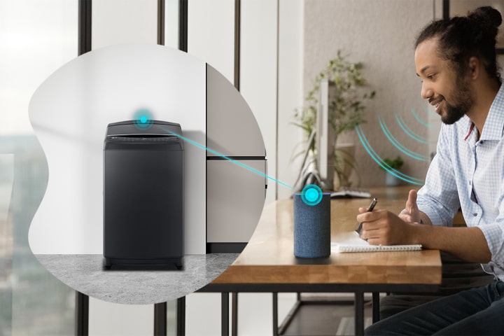 A man controlling the LG top load washing machine with voice assistant