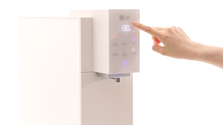 Image of finger touching the display button of the water purifier	