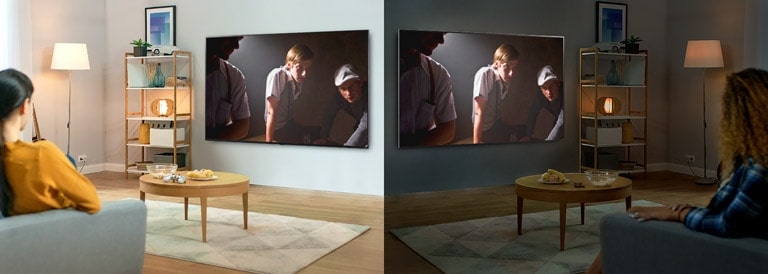 Two women watching the same scene on TV in mirrored living rooms and different brightness conditions