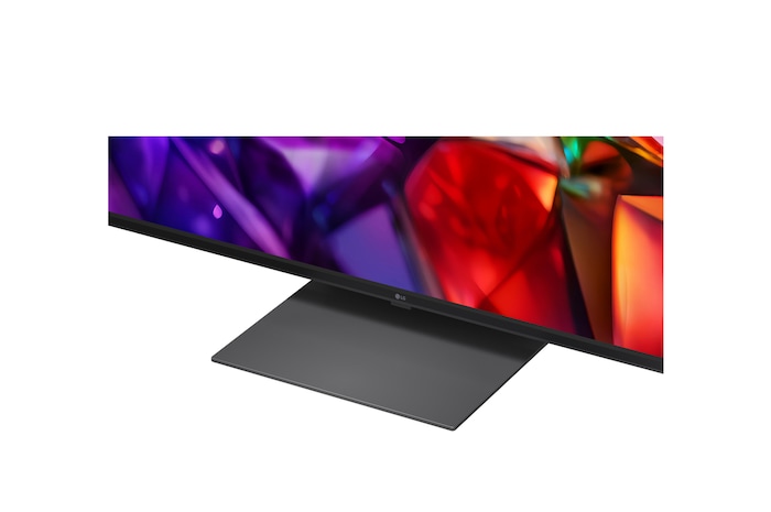 LG Micro RGB evo AI MRGB95, offering up to 100 inches, is wall-mounted in a spacious modern living room. Displaying a vivid, colorful landscape that highlights rich color and fine detail, elevating the interior to a new level.