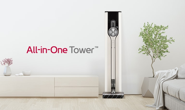 แสดงให้เห็นภาพด้านหน้าของ A9 All-in-One Tower ในห้องนั่งเล่นโทนสีขาวที่ตกแต่งอย่างทันสมัย