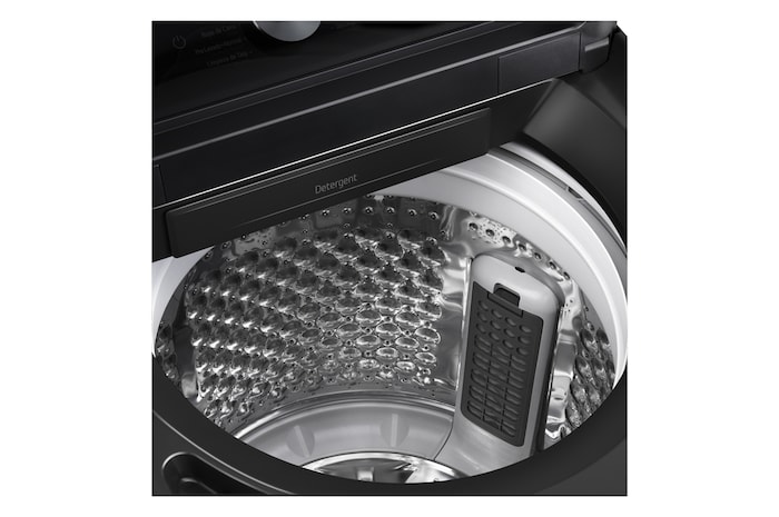 Woman unloading laundry from a top loading washing machine, featuring EasyUnload™.