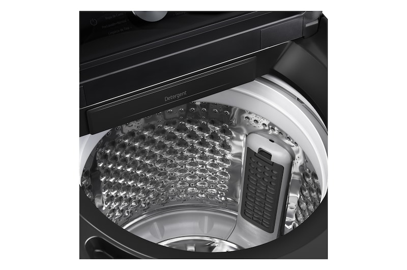 Woman unloading laundry from a top loading washing machine, featuring EasyUnload™.