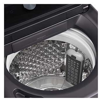 Woman unloading laundry from a top loading washing machine, featuring EasyUnload™.