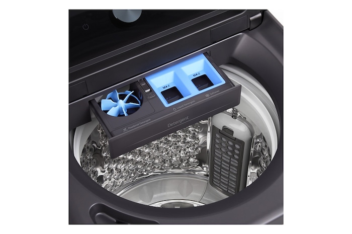 Top loading washing machine with lid in motion, showing soft closing door function.