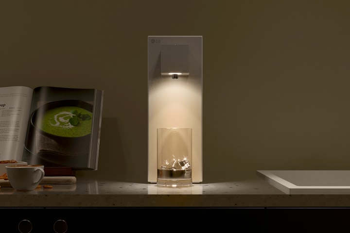 LG water purifier with warmbeige light on.