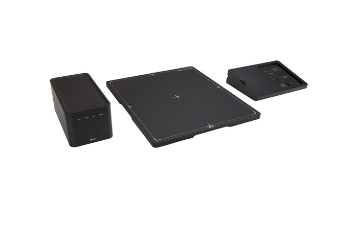 มุมมองจากด้านบนของเครื่องตรวจเอ็กซ์เรย์ดิจิตอล LG 17HQ901G พร้อมกล่องควบคุมและอุปกรณ์ชาร์จแบตเตอรี่