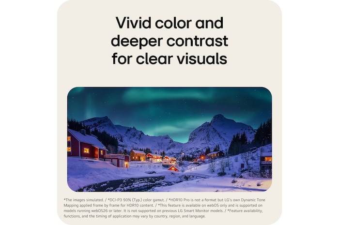 Snowy mountain village under northern lights at night.