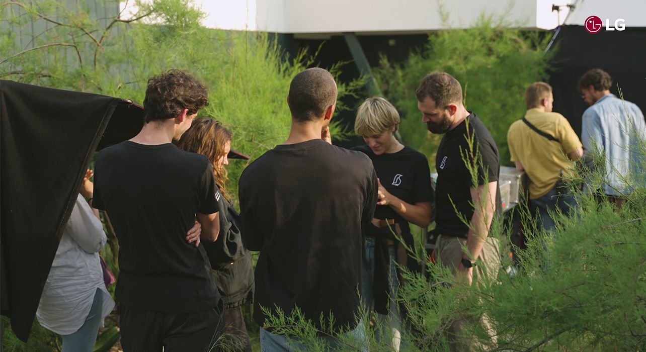 People gathered in the grass